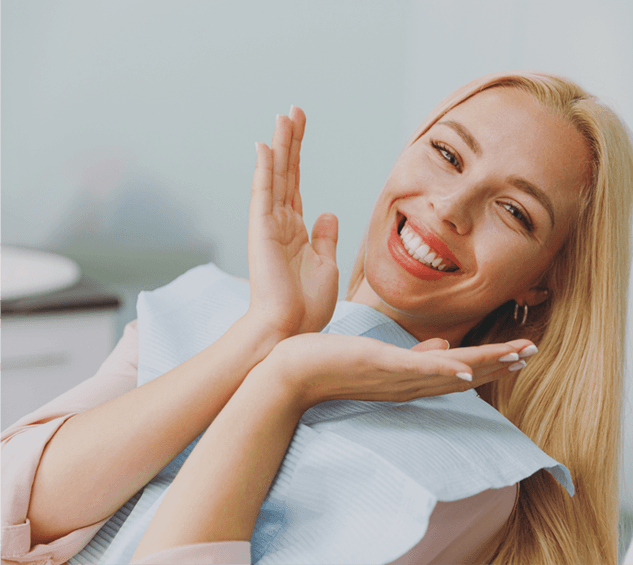 A patient laughing in the dental chair